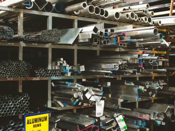 A rack of different types of aluminum tubing