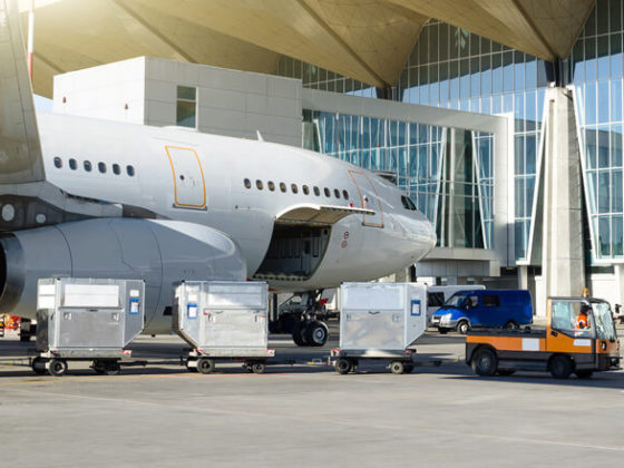 Airplane being unloaded at airport