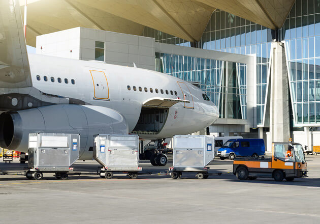 Airplane being unloaded at airport