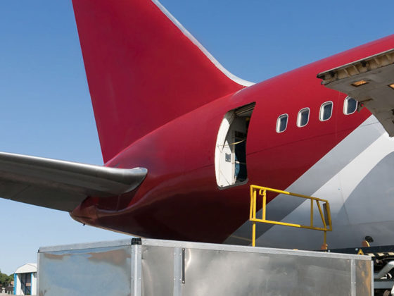 Container being loaded onto a cargo plane